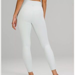 White lululemon cropped leggings 25 inch.  Never worn